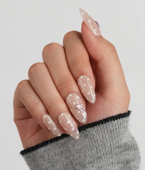 Salt & Sand beach nails with blue starfish, pink dolphin, and sea-foam dots