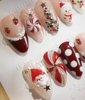 Holiday Party handmade press-on nails featuring pearl nude cat eye snowflake bow silver glitter soft sheen