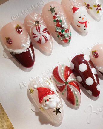 Holiday Party handmade press-on nails featuring pearl nude cat eye snowflake bow silver glitter soft sheen