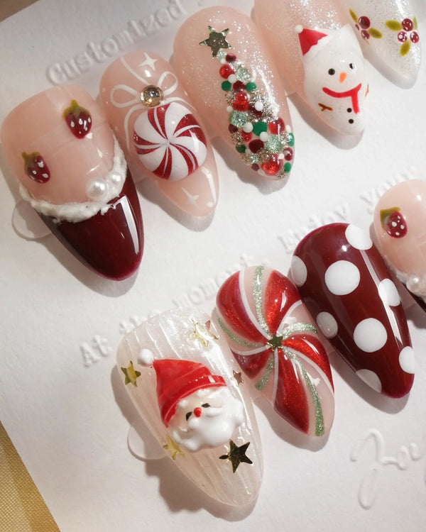Santa Christmas press-on nails with candy and snowman details
