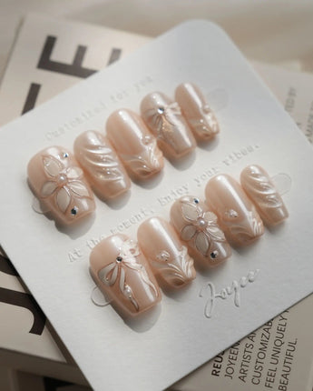 Satin Dress press-on nails — nude pink pearl sheen 3D floral ribbon embossed handmade nail art by Joyee Nails