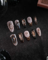 Scorpio press on nails with a hand-painted copper scorpion, barbed wire, bats, snake and thorns on nude and smoked black cat eye - image 3