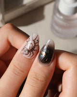 Scorpio press on nails with a hand-painted copper scorpion, barbed wire, bats, snake and thorns on nude and smoked black cat eye - image 4