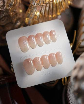 Sheer Stardust nails in short oval — Icy Nude Ombre Gradient,
