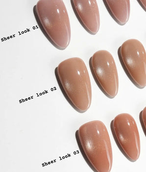 Sheer Look Team #1 handmade press-on nails featuring nude cat eye