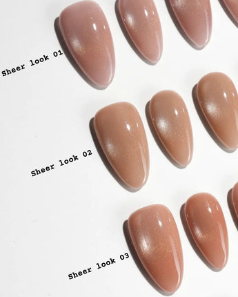Sheer Look Team #1 handmade press-on nails featuring nude cat eye