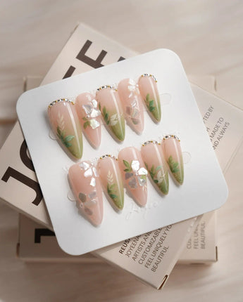 Shell Blossom nail art close-up showing Gentle Pink & Green Gradient, Shell Fragment Petals & Hand-painted Leaves. details