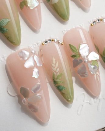 Shell Blossom handmade press-on nails featuring Gentle Pink & Green Gradient, Shell Fragment Petals & Hand-painted Leaves.