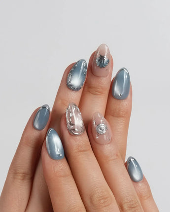 Shell Money extra short almond set with silver shells on sandy nude and blue gel