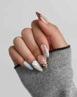 Shore Blend wearable neutral press-on nails with silver accents and coastal palette
