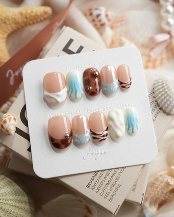 Shore Blend coastal color-block press-on nails in short oval shape