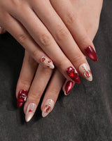 Sweet Bite nails in short almond — Deep Red & Nude