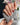 Short almond orange press-on nails featuring French tips