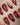 Short almond red nails with cat-eye finish