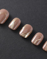 Poetic Glamour Nude press-on nails in short squoval shape — nude french tip gold line