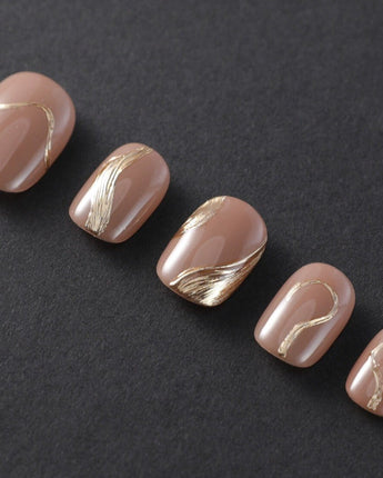 Poetic Glamour Nude press-on nails in short squoval shape — nude french tip gold line