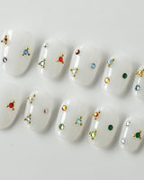 Sicily nails press-on nails in extra short oval shape — milky white colorful rhinestone nails