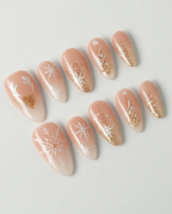 Silent Night press-on nails in short almond shape — Champagne Gold Glitter, Christmas Reindeer & Snowflakes.