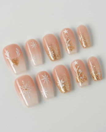 Silent Night press-on nails in short coffin shape — Champagne Gold Glitter, Christmas Reindeer & Snowflakes.