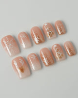 Silent Night press-on nails in short square shape — Champagne Gold Glitter, Christmas Reindeer & Snowflakes.