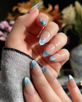 Silk Azure handmade press-on nails featuring Ice Blue Cat Eye, French Silver Wire.