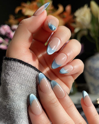 Silk Azure handmade press-on nails featuring Ice Blue Cat Eye, French Silver Wire.