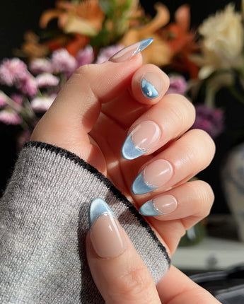 Silk Azure nail art close-up showing Ice Blue Cat Eye, French Silver Wire. details
