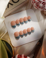 Silk Azure press-on nails in extra short oval shape — Ice Blue Cat Eye, French Silver Wire.