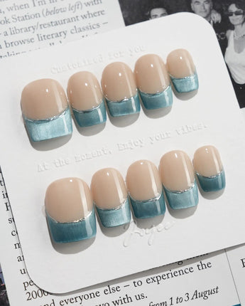 Silk Azure press-on nails in extra short square shape — Ice Blue Cat Eye, French Silver Wire.