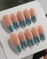 Silk Azure press-on nails in medium stiletto shape — Ice Blue Cat Eye, French Silver Wire.