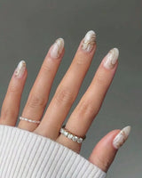 Silk Bow press-on nails in short oval shape — Luxury Creamy White & Gold, 3D Champagne Gold Wire Bows & Fine Shimmer.