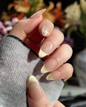Silk Glow nail art close-up showing Light Gold Cat Eye, French Gold Wire. details