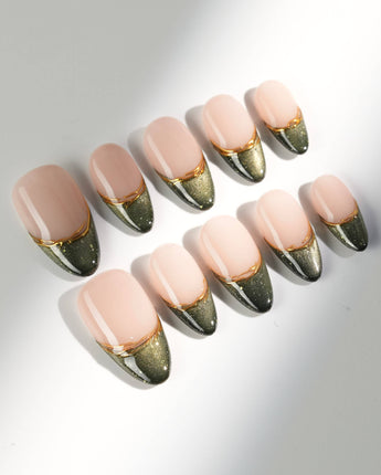 Silk Green press-ons with rich green shimmer, French tip shape, and fine gold detail