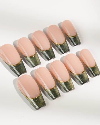 Silk Green in long coffin shape with dark green cat-eye French tips and gold linework