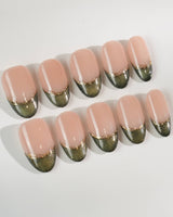 Silk Green in medium oval shape with glossy emerald French tips and fine gold accents