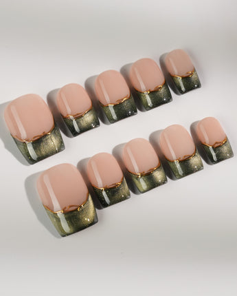 Silk Green in short square shape with dark green French tips and metallic gold wire
