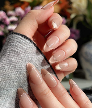 Silk Mousse handmade press-on nails featuring Champagne Cat Eye, French Silver Wire.