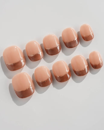 Silk Mousse in extra short squoval shape with champagne cat-eye and silver French accents