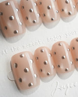 Silver Bead custom-size square nails with metallic bead texture and nude shimmer