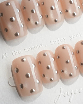 Silver Bead custom-size square nails with metallic bead texture and nude shimmer