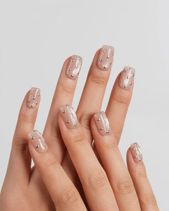 Silver Bead short square nails with silver bead dots catching light on champagne shimmer