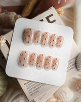 Silver Bead minimalist nail set with hand-placed silver ball beads on nude gel