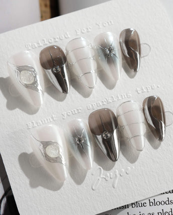 Silver Flame press-on nails in short stiletto shape — silver chrome metallic 3D sculpted nails