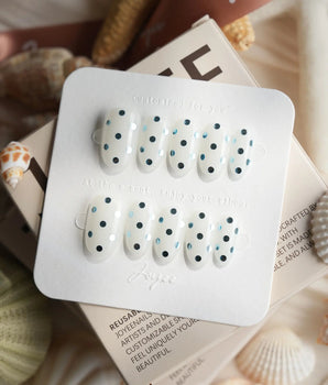 Silver Rain metallic dot nails with mirror-like silver droplets and monochrome gloss