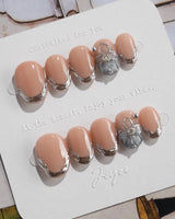 Silver Shore extra short oval nails with metallic French contours and understated shine