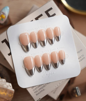 Silver Sleek handmade nails with metallic silver chrome tips and glossy gel finish