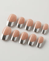 Silver Sleek short oval nails with glossy silver chrome French tips