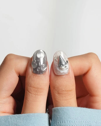 Silver Spoon chrome press-on nails with cool grey marble and scattered silver charms