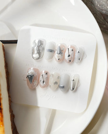 Silver Spoon glossy monochrome nail set with futuristic chrome dessert details