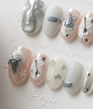 Silver Spoon metallic dessert nail art with silver ice cream cone, stars, and butterflies